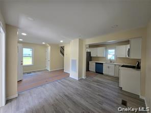 1-3 Chestnut Street Middletown, NY 10940 - Photo 19 of 19 a view of a kitchen cabinets and wooden floor