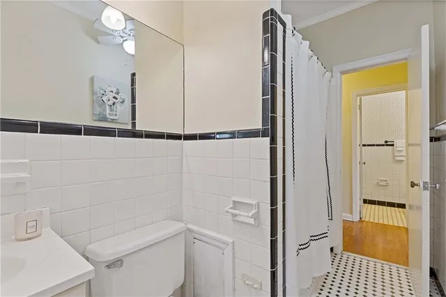 a bathroom with a shower and toilet