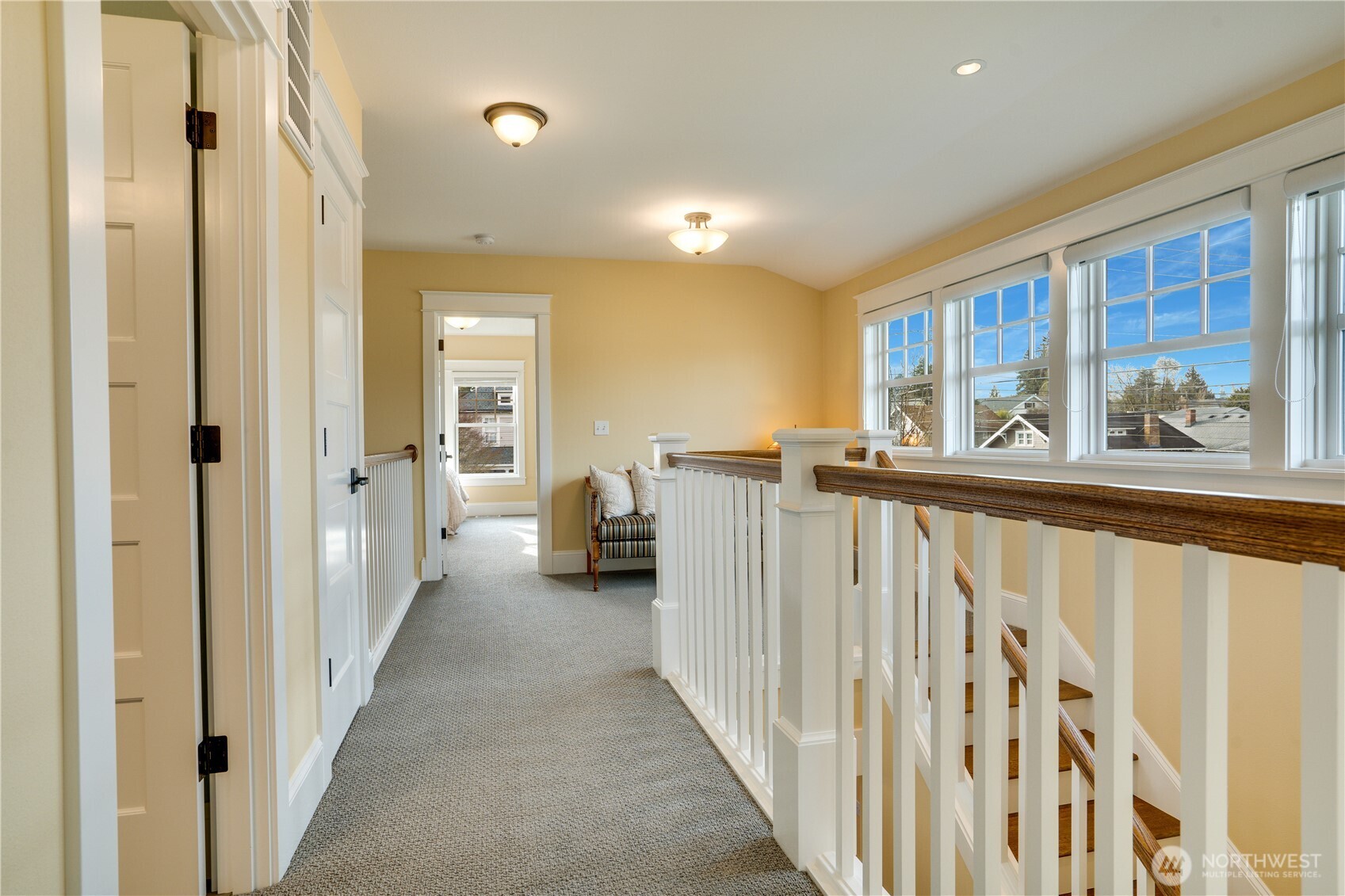 3501 North Stevens Street Tacoma, WA 98407 - Photo 23 of 39 a view of a hallway with wooden floor and windows