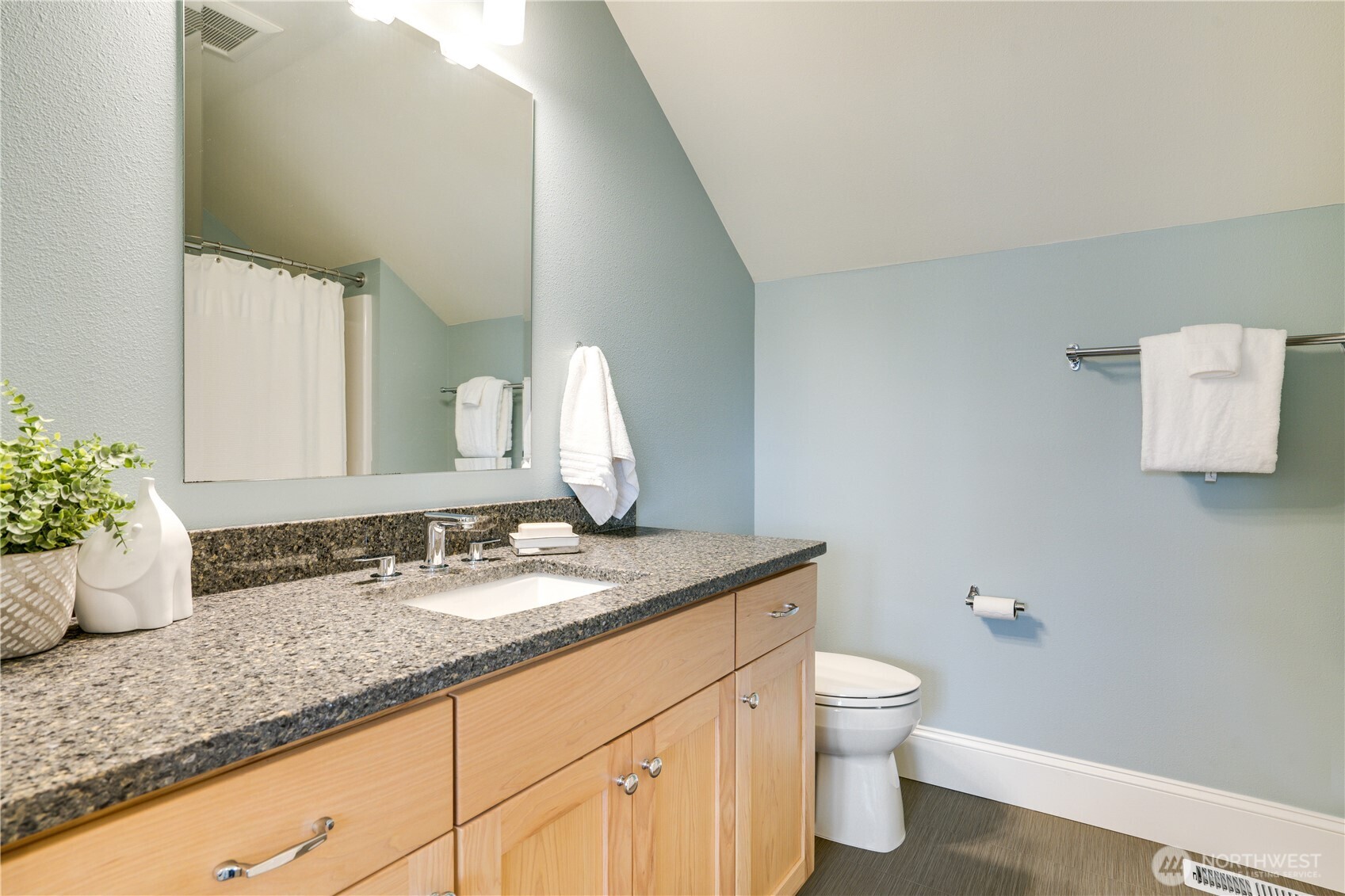 3501 North Stevens Street Tacoma, WA 98407 - Photo 24 of 39 a bathroom with a granite countertop sink a toilet and a mirror