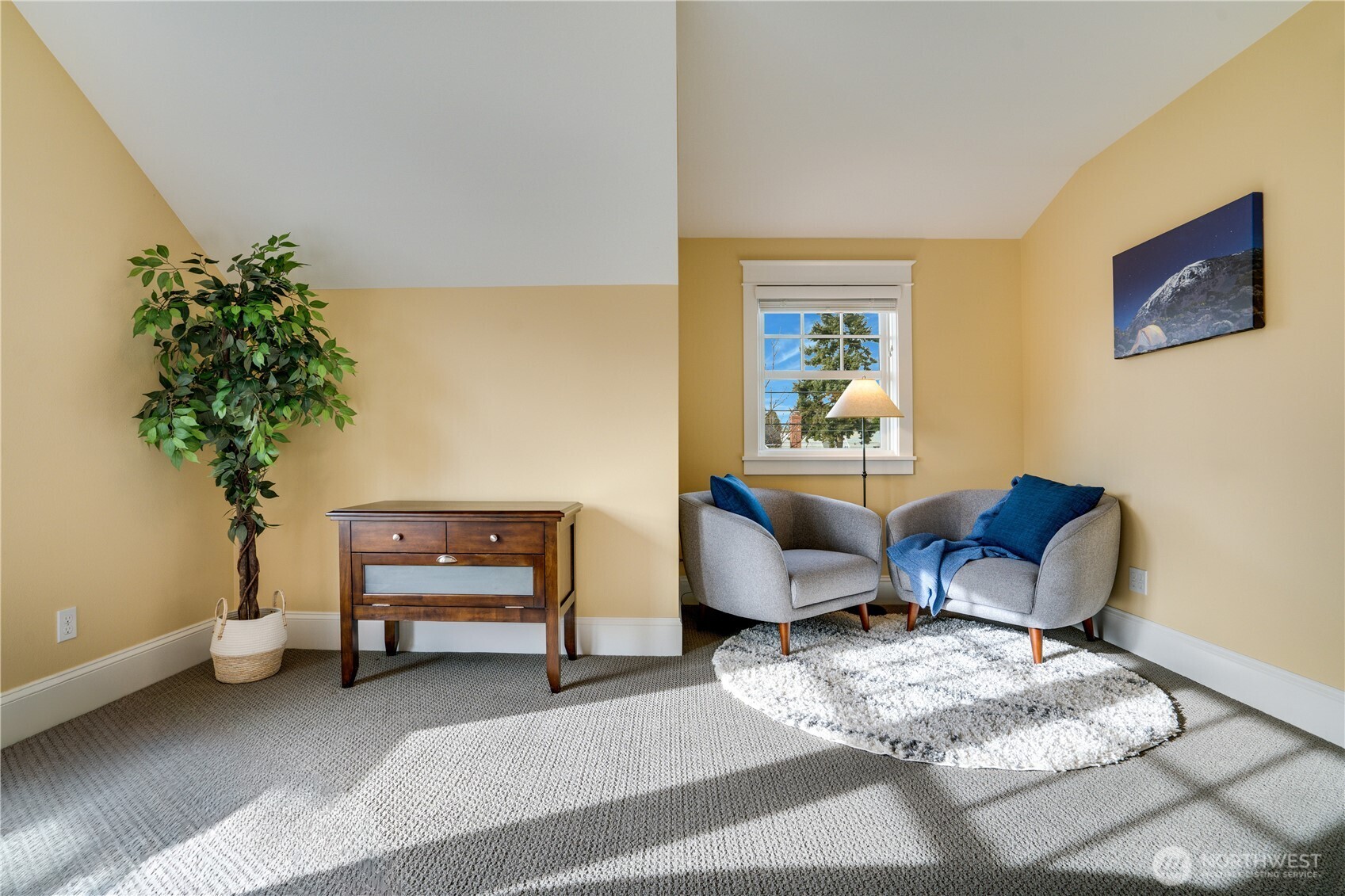 3501 North Stevens Street Tacoma, WA 98407 - Photo 29 of 39 a bedroom with furniture and a potted plant