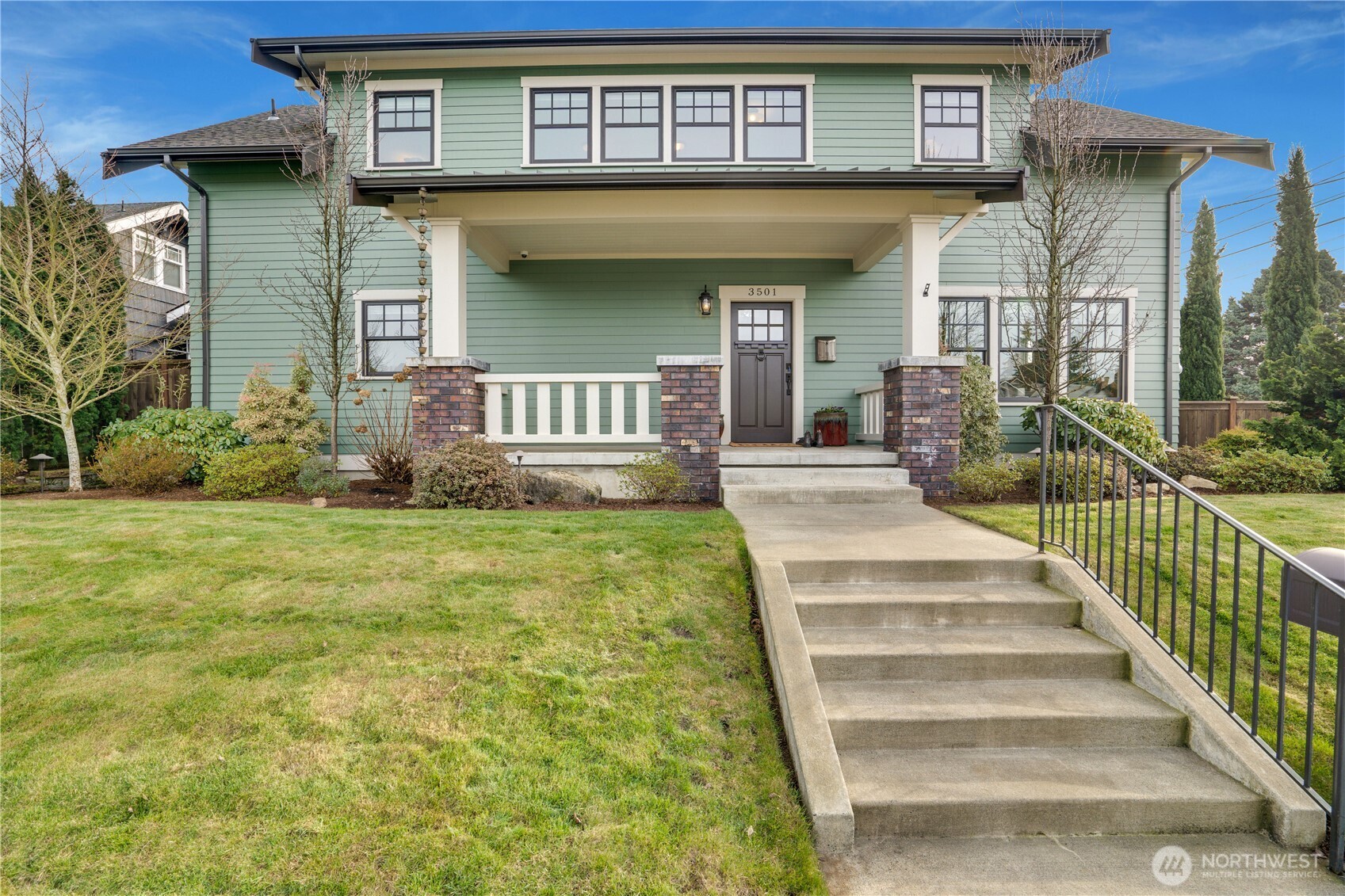 3501 North Stevens Street Tacoma, WA 98407 - Photo 4 of 39 a view of a brick house with large windows