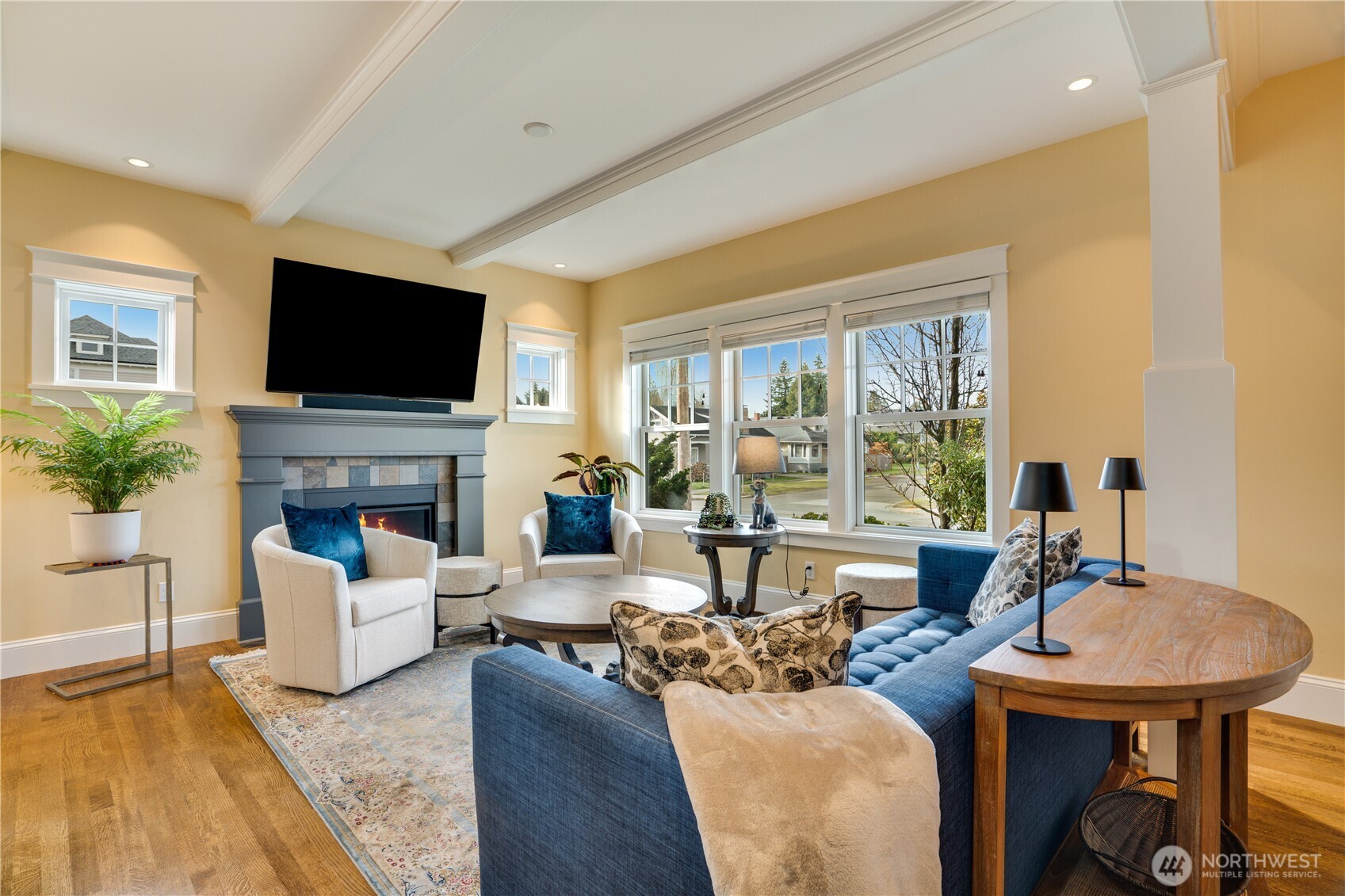 3501 North Stevens Street Tacoma, WA 98407 - Photo 7 of 39 a living room with fireplace furniture and a flat screen tv