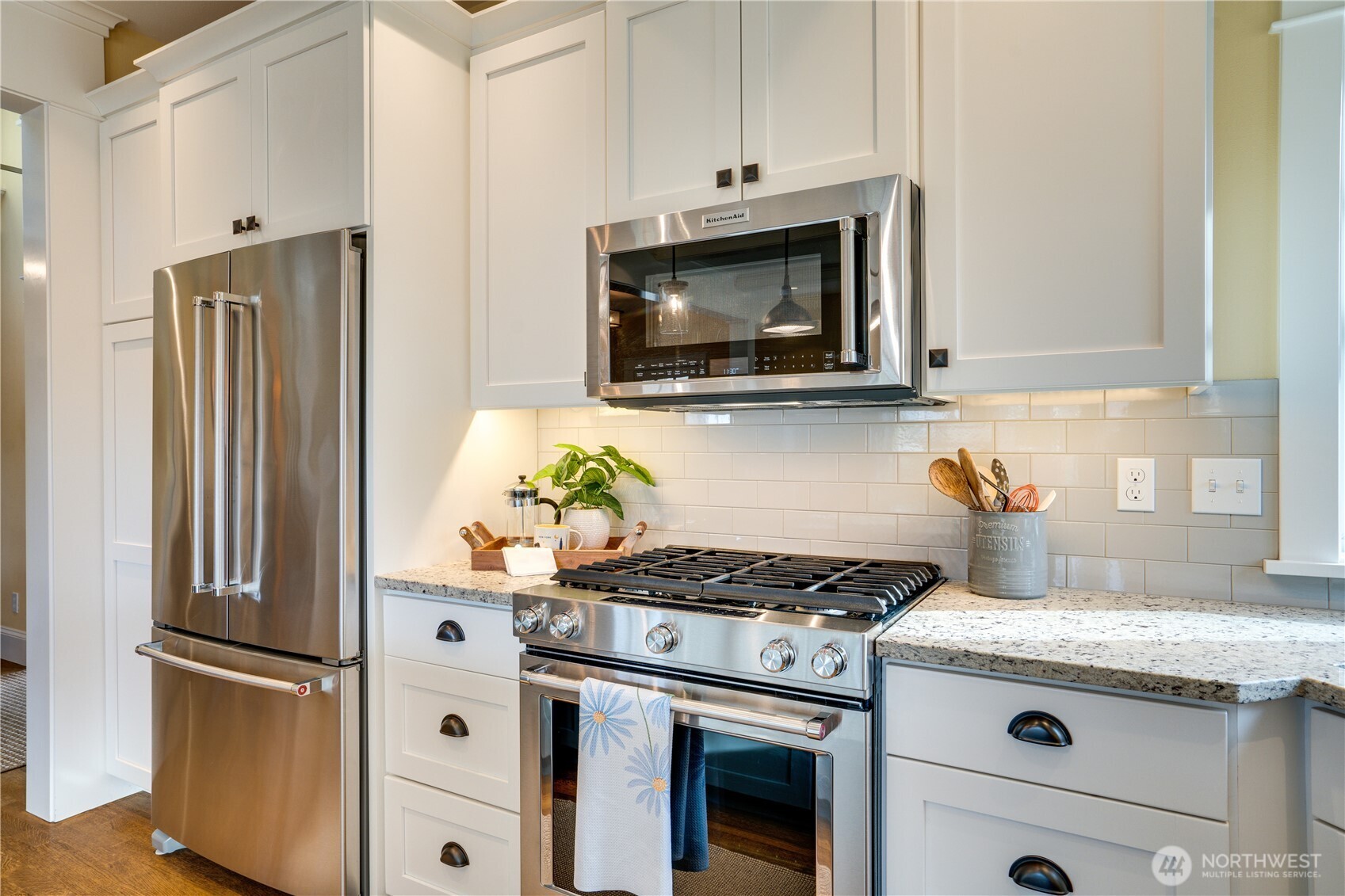 3501 North Stevens Street Tacoma, WA 98407 - Photo 9 of 39 a kitchen with granite countertop a stove and a microwave