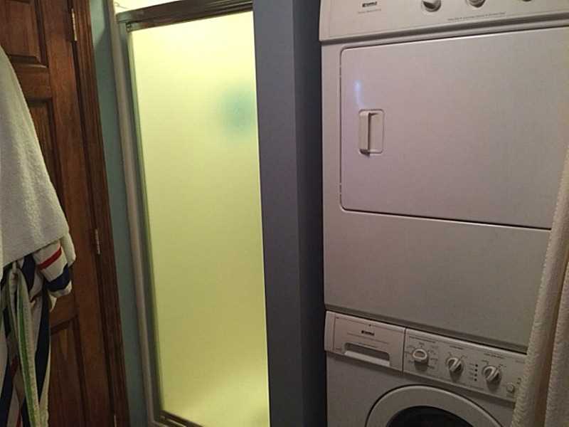 7 Seneca Street Coventry, RI 02816 - Photo 20 of 25 Bathroom. Remodeled Lower Level Bathroom with washer & dryer included