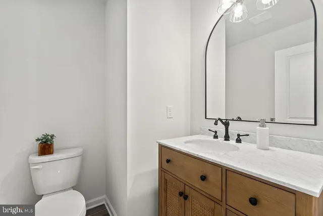 a kitchen with cabinets a sink and appliances