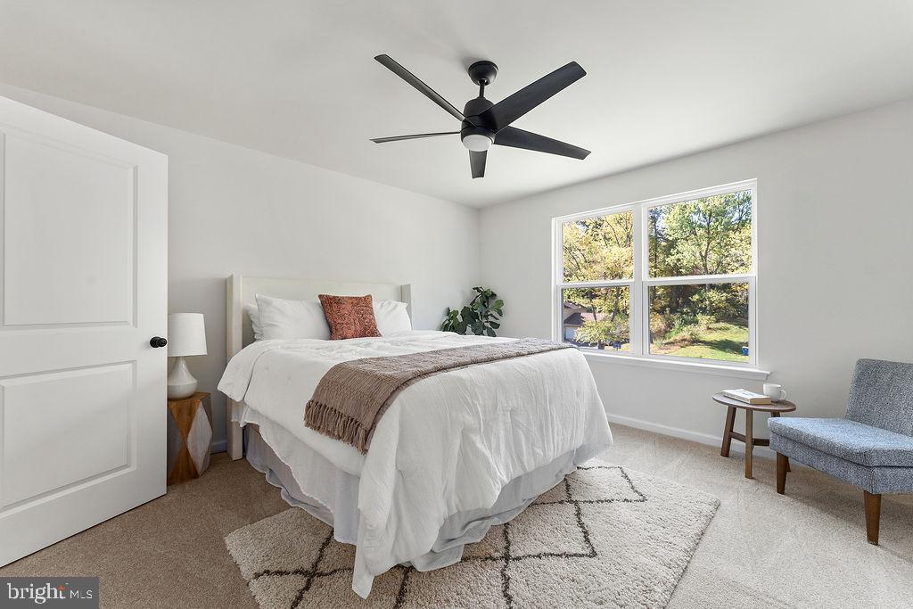 6 Willow Branch Lane Fredericksburg, VA 22405 - Photo 17 of 56 a bedroom with a bed and window