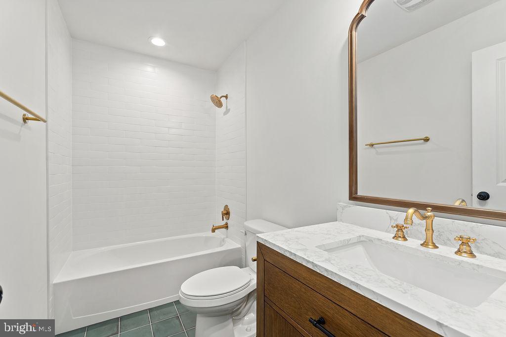 6 Willow Branch Lane Fredericksburg, VA 22405 - Photo 29 of 56 a bathroom with a granite countertop sink mirror vanity and toilet