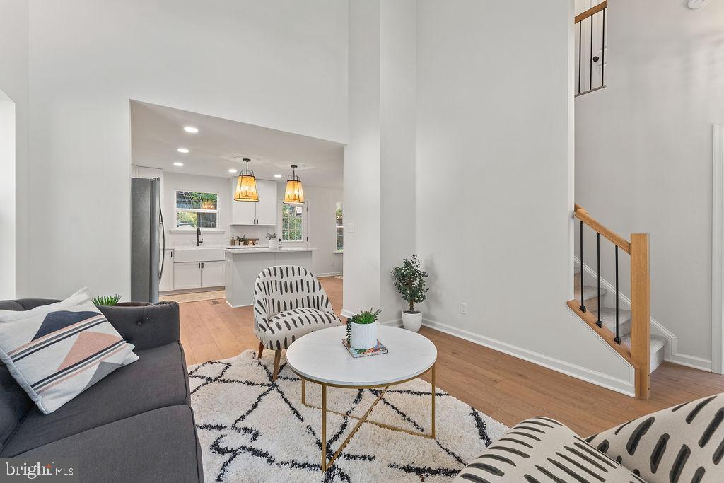 6 Willow Branch Lane Fredericksburg, VA 22405 - Photo 3 of 56 a living room with furniture and a wooden floor