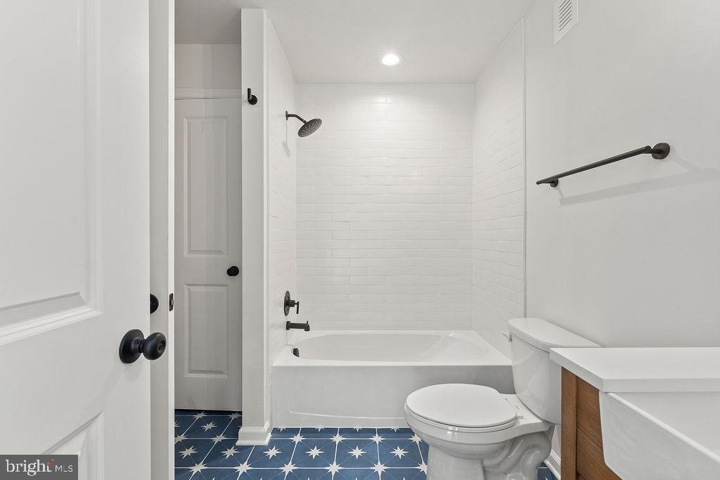 6 Willow Branch Lane Fredericksburg, VA 22405 - Photo 39 of 56 a bathroom with a sink toilet and shower