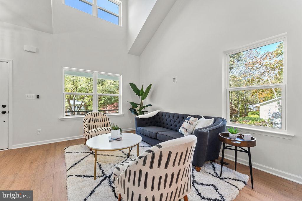 6 Willow Branch Lane Fredericksburg, VA 22405 - Photo 4 of 56 a living room with furniture a table and a potted plant