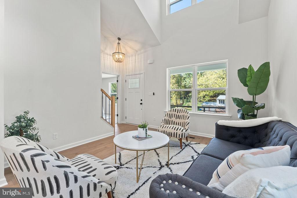 6 Willow Branch Lane Fredericksburg, VA 22405 - Photo 6 of 56 a living room with furniture a window and a potted plants
