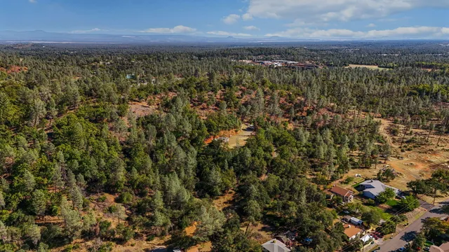 an aerial view of residential house with outdoor space