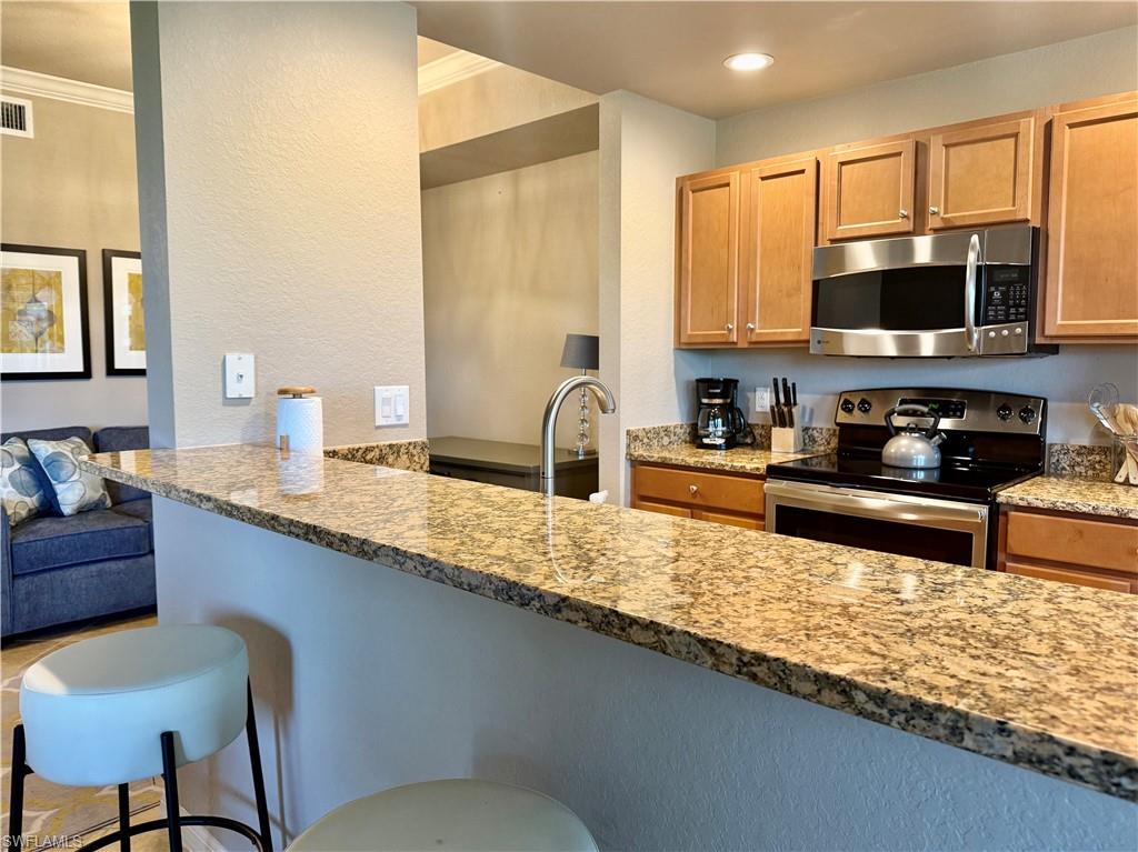 9735 Acqua Court, Unit 637 Naples, FL 34113 - Photo 10 of 47