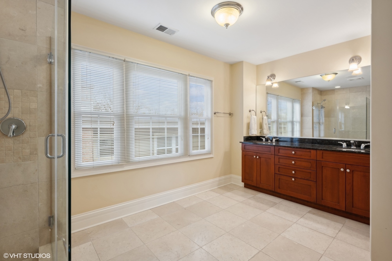 410 Green Bay Road Glencoe, IL 60022 - Photo 12 of 27 a large bathroom with a large tub shower and sink