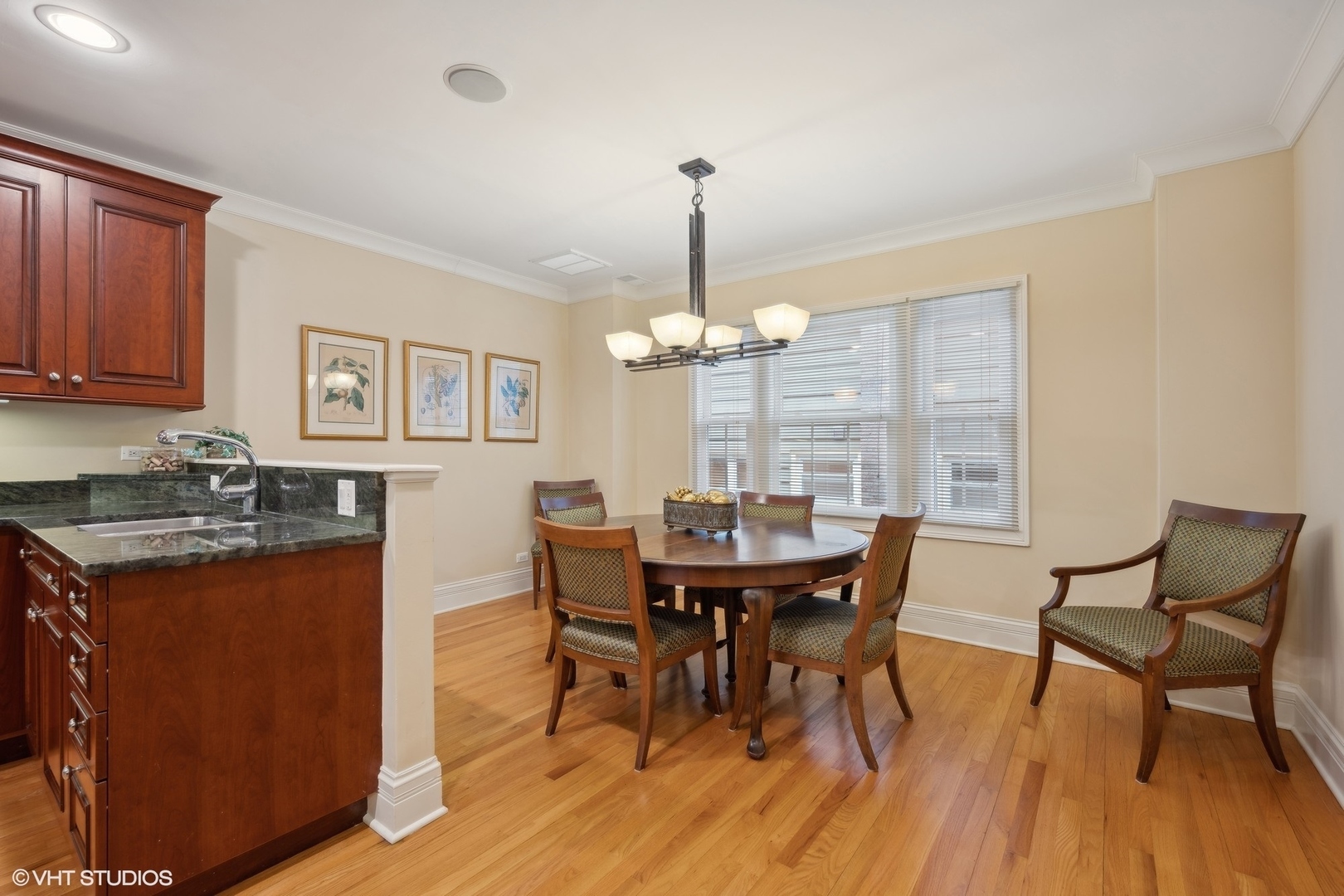 410 Green Bay Road Glencoe, IL 60022 - Photo 8 of 27 a view of a dining room with furniture and wooden floor