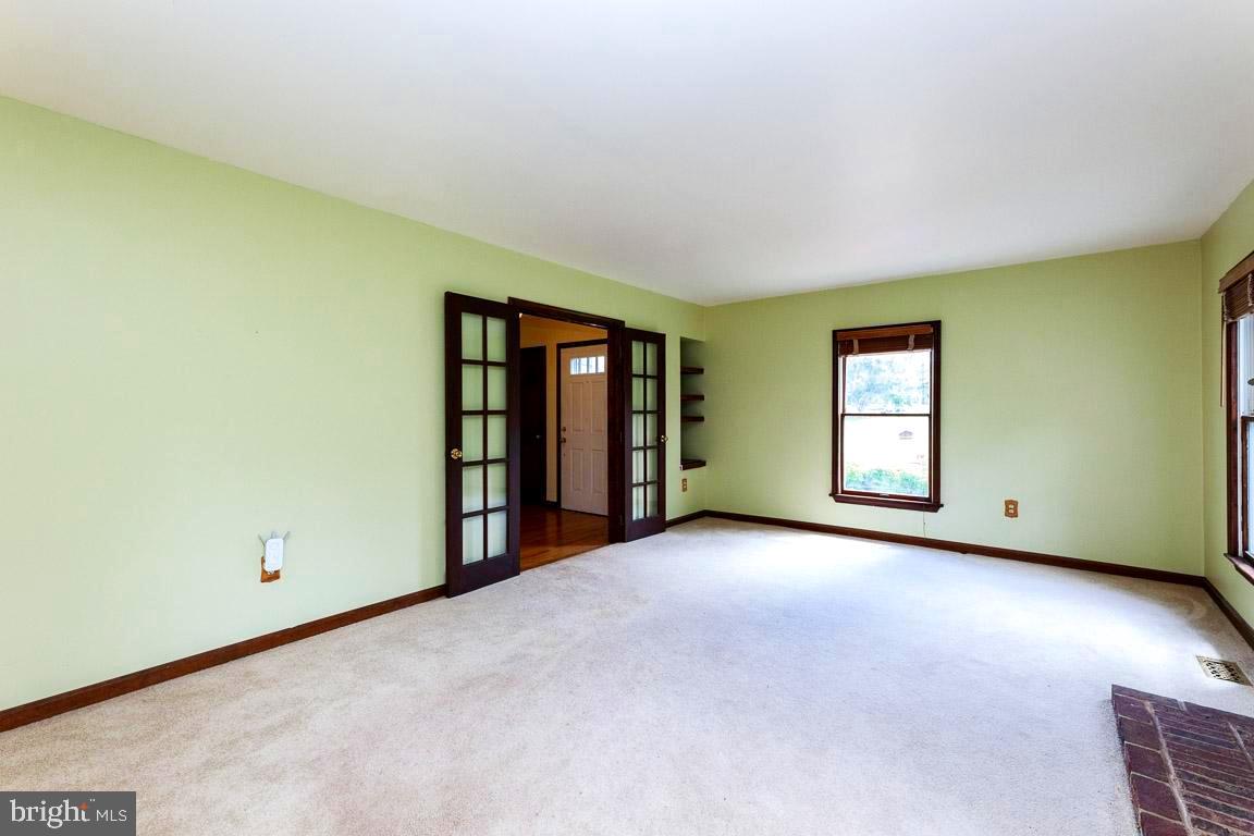 4874 Executive Drive Gainesville, VA 20155 - Photo 13 of 74 French doors in formal living room