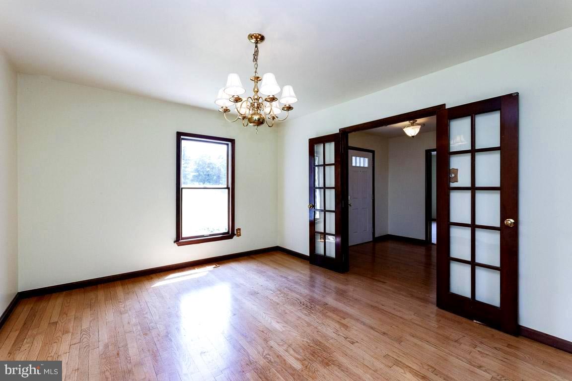 4874 Executive Drive Gainesville, VA 20155 - Photo 14 of 74 French doors in formal dining room