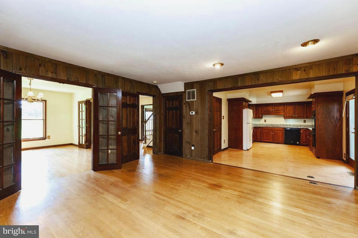 4874 Executive Drive Gainesville, VA 20155 - Photo 24 of 74 Formal dining room, Family room and Kitchen