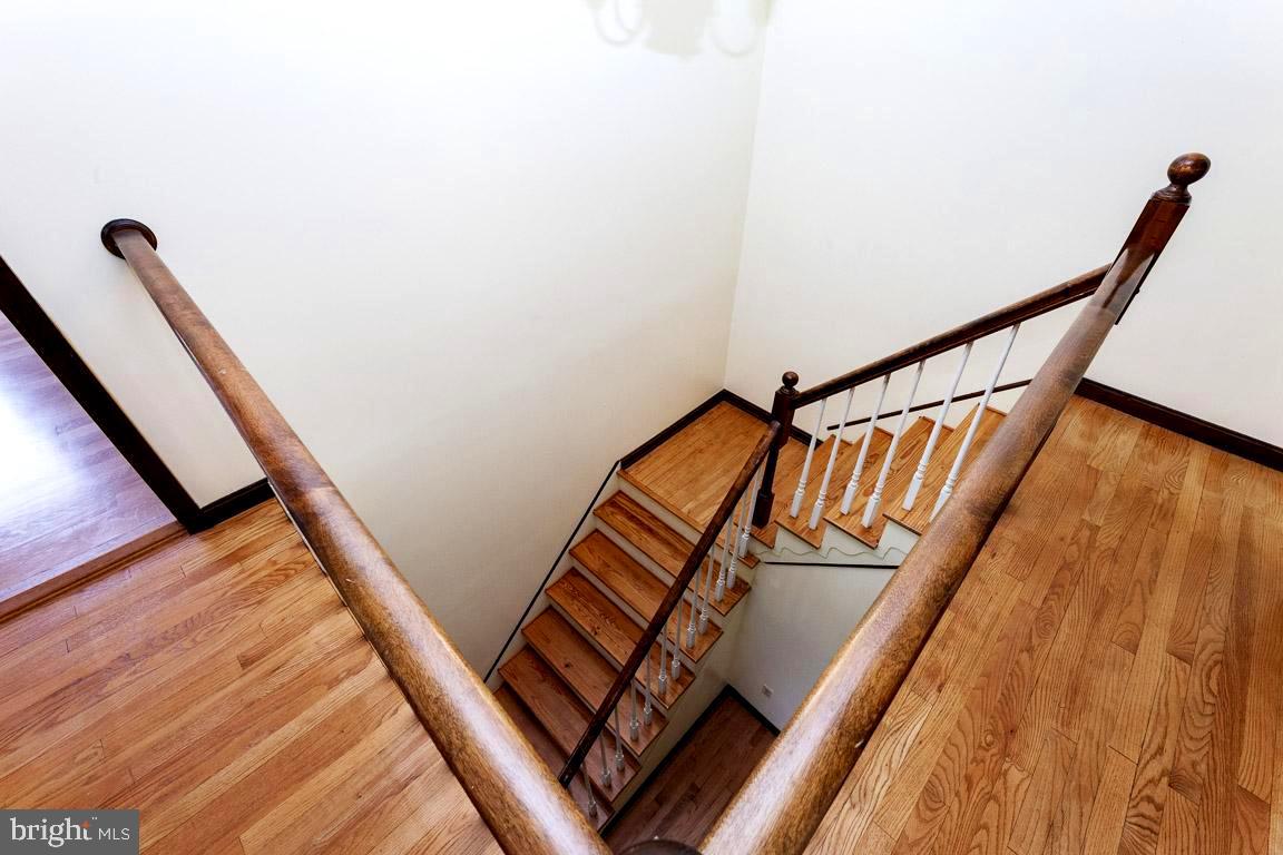 4874 Executive Drive Gainesville, VA 20155 - Photo 46 of 74 Main staircase