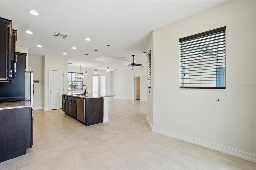 7505 Carissa Punta Gorda, FL 33955 - Photo 25 of 57 a view of kitchen with refrigerator and windows