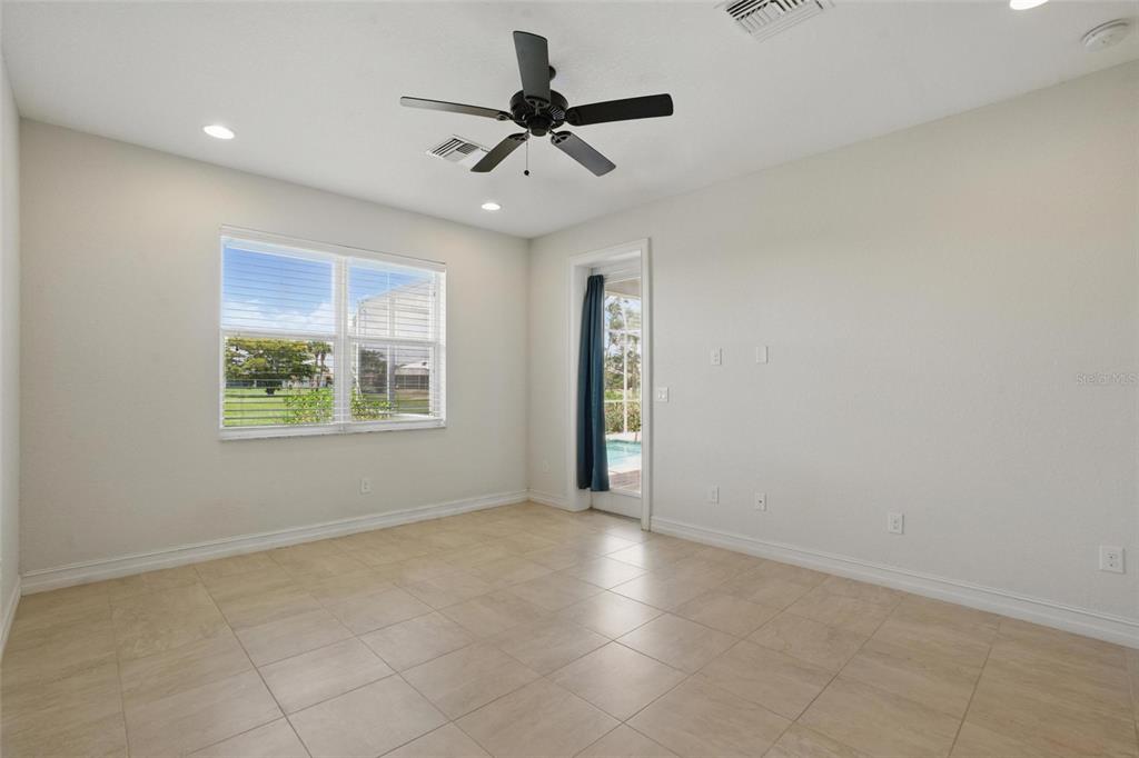7505 Carissa Punta Gorda, FL 33955 - Photo 27 of 57 wooden floor in an empty room with a window