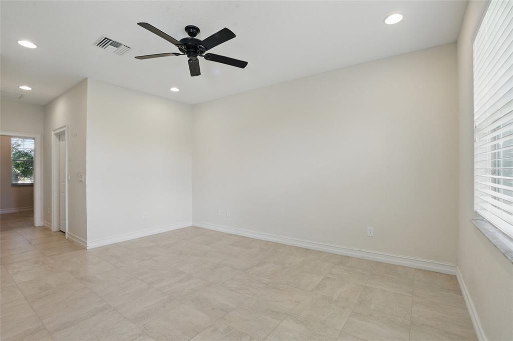 7505 Carissa Punta Gorda, FL 33955 - Photo 29 of 57 wooden floor in an empty room with a window