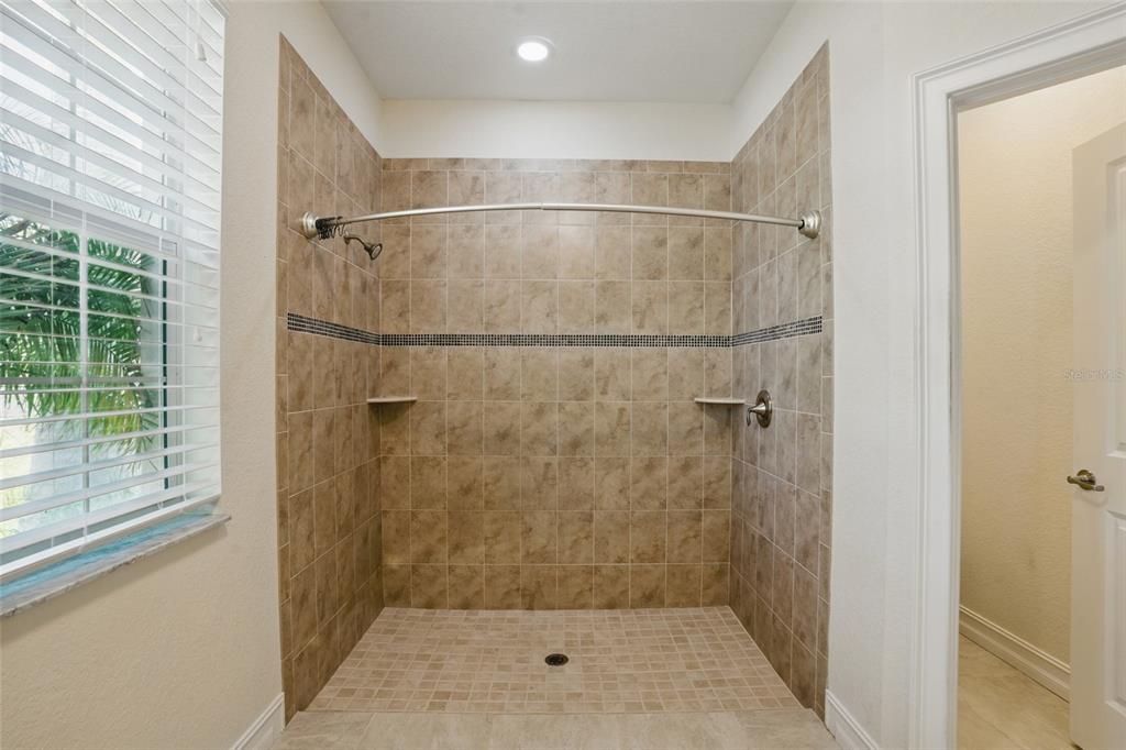 7505 Carissa Punta Gorda, FL 33955 - Photo 32 of 57 a bathroom with a shower