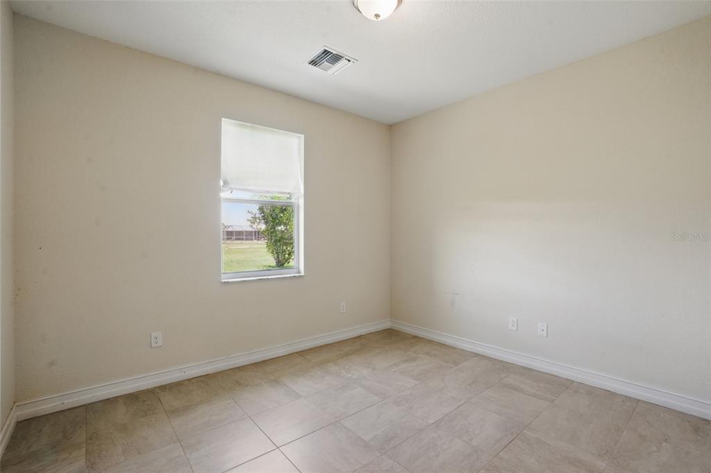 7505 Carissa Punta Gorda, FL 33955 - Photo 34 of 57 an empty room with a window