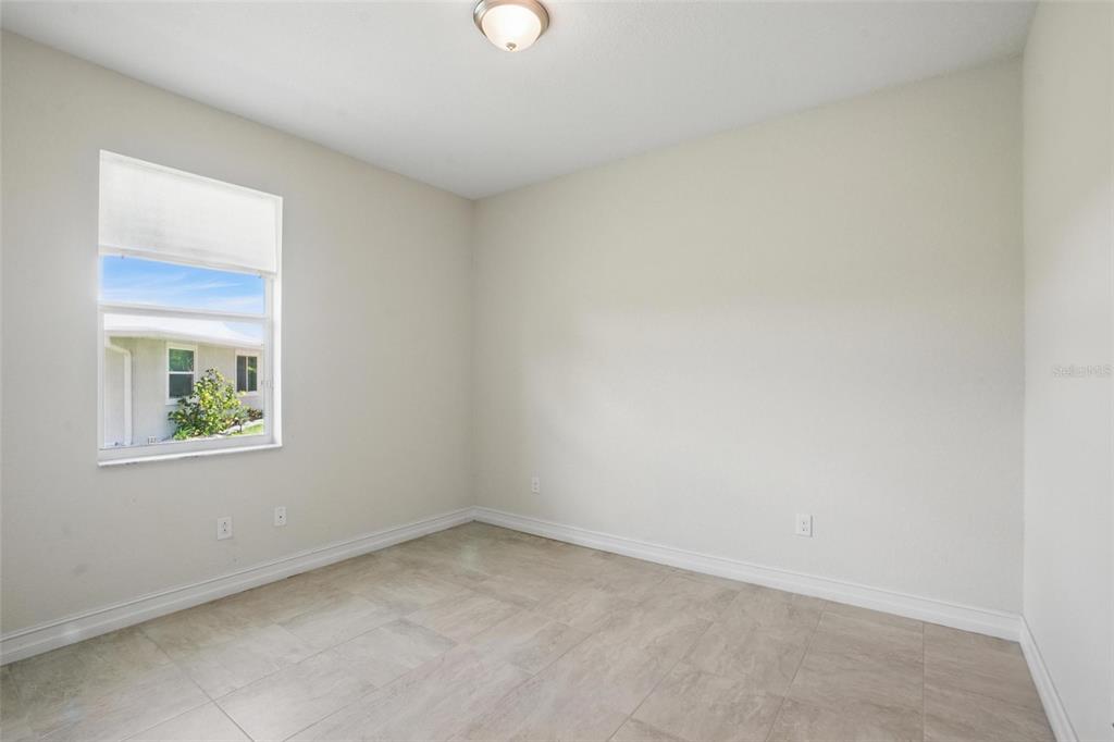 7505 Carissa Punta Gorda, FL 33955 - Photo 37 of 57 an empty room with windows