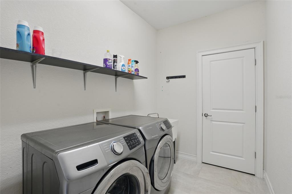 7505 Carissa Punta Gorda, FL 33955 - Photo 39 of 57 a utility room with dryer and washer