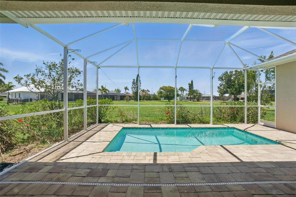7505 Carissa Punta Gorda, FL 33955 - Photo 44 of 57 a view of a backyard with a tub and entertaining space