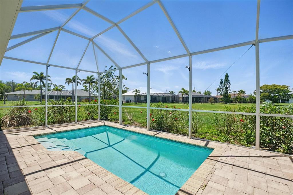 7505 Carissa Punta Gorda, FL 33955 - Photo 48 of 57 a view of a swimming pool with a yard