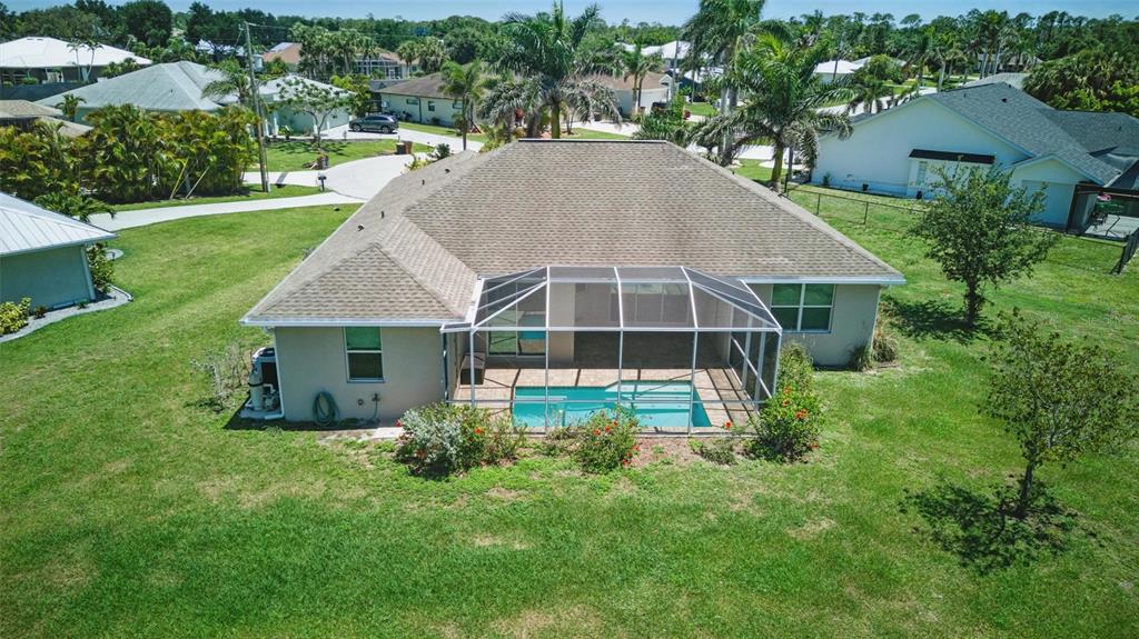 7505 Carissa Punta Gorda, FL 33955 - Photo 53 of 57 a house with green field in front of it