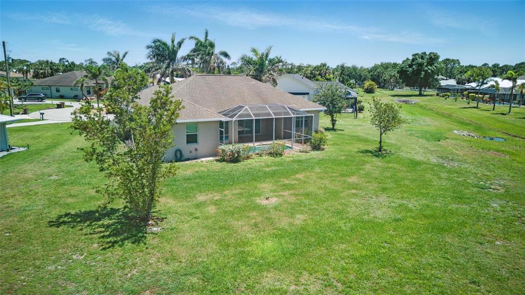 7505 Carissa Punta Gorda, FL 33955 - Photo 56 of 57 a view of a house with a big yard