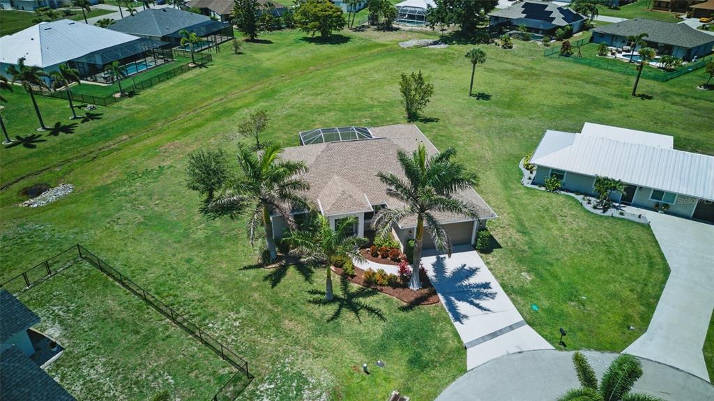 7505 Carissa Punta Gorda, FL 33955 - Photo 8 of 57 an aerial view of a house with pool yard and outdoor seating