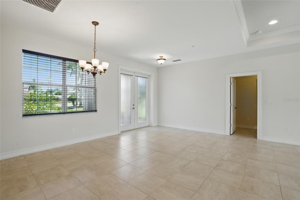 7505 Carissa Punta Gorda, FL 33955 - Photo 10 of 57 a view of an empty room with window