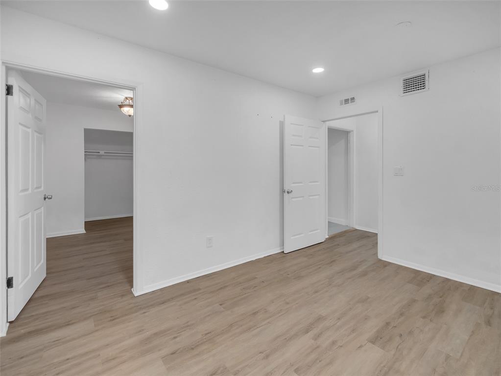 2600 Euston Road Winter Park, FL 32789 - Photo 23 of 36 wooden floor in an empty room with a window