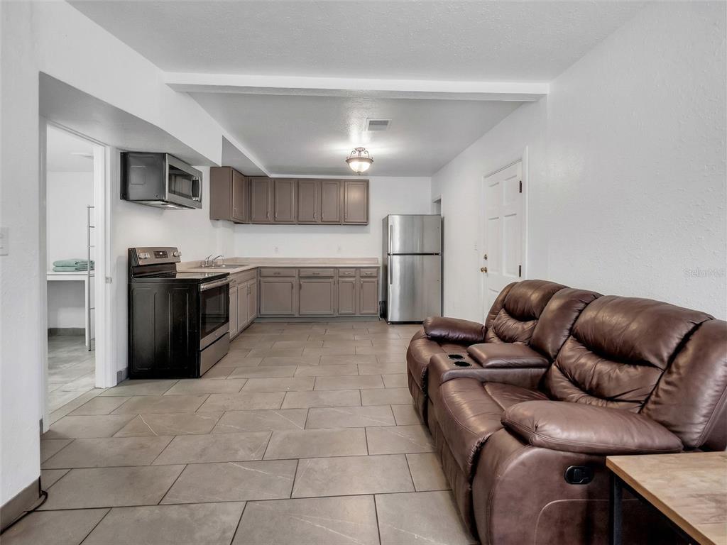 2600 Euston Road Winter Park, FL 32789 - Photo 5 of 36 a living room with stainless steel appliances furniture and kitchen view