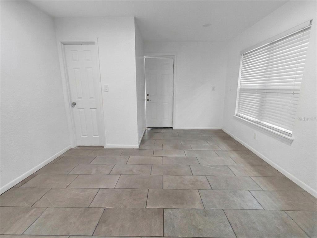 2600 Euston Road Winter Park, FL 32789 - Photo 8 of 36 a view of an empty room with a window