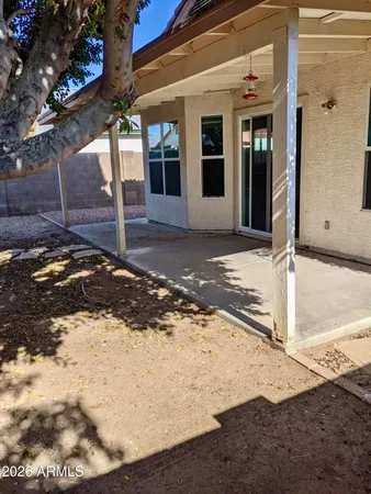 a view of a backyard of a house