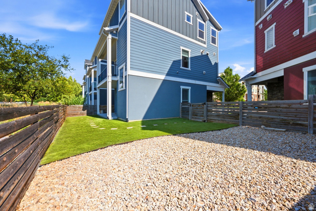 862 Founders Point Lane South Midvale, UT 84047 - Photo 34 of 45 Multi-level exterior with blue siding and white trim