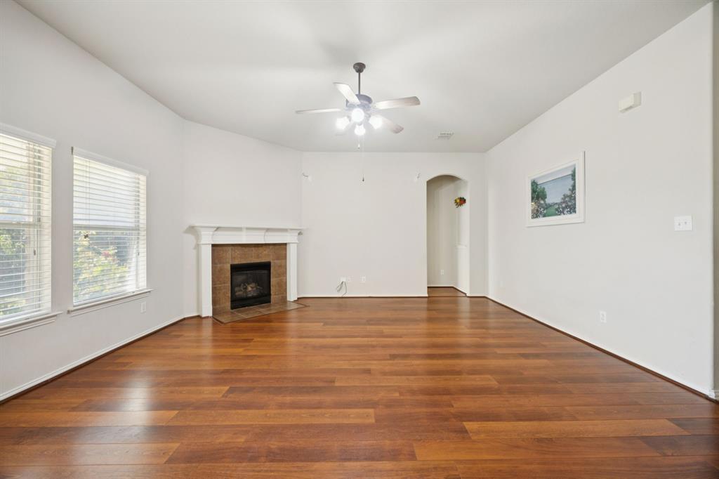 3501 Gravel Circle North Grapevine, TX 76092 - Photo 10 of 36 a view of an empty room with window and wooden floor