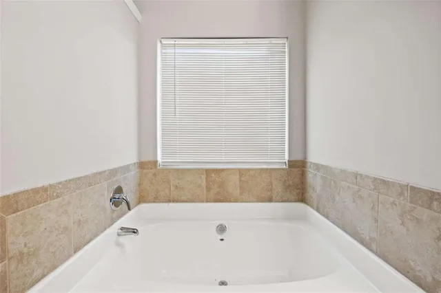 a bathroom with a bathtub