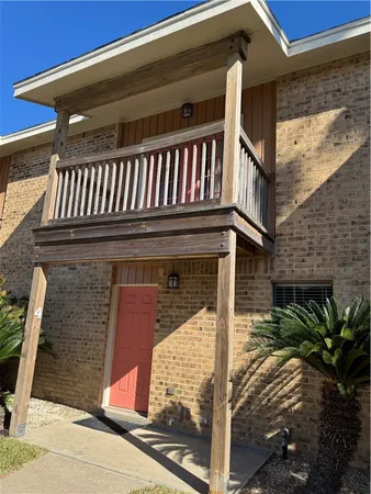 a view of a house with a balcony