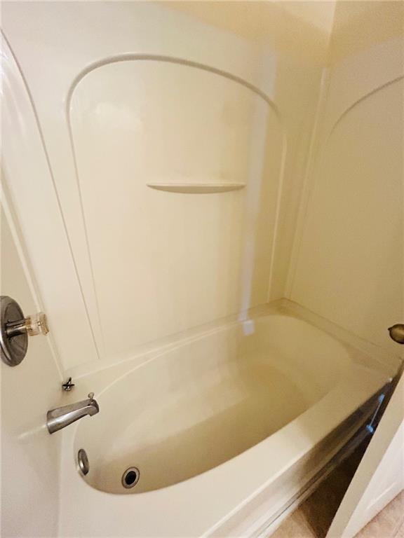 2920 Centerglen Lane Cumming, GA 30040 - Photo 12 of 14 a bath tub sitting next to a shower