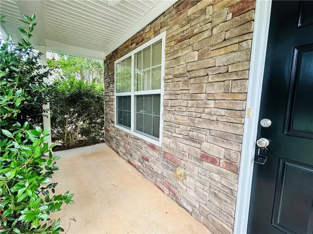 a view of entrance gate of a house