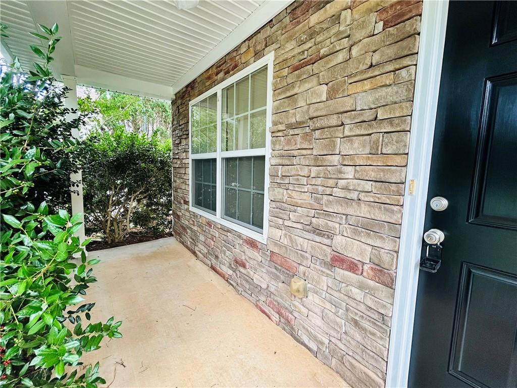 2920 Centerglen Lane Cumming, GA 30040 - Photo 2 of 14 a view of entrance gate of a house