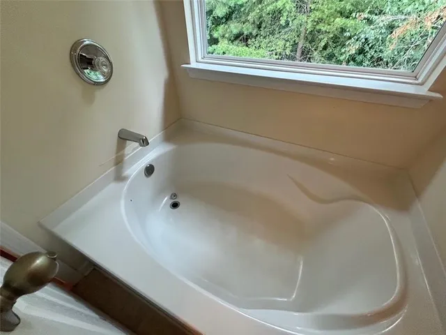 a bathroom with a bathtub