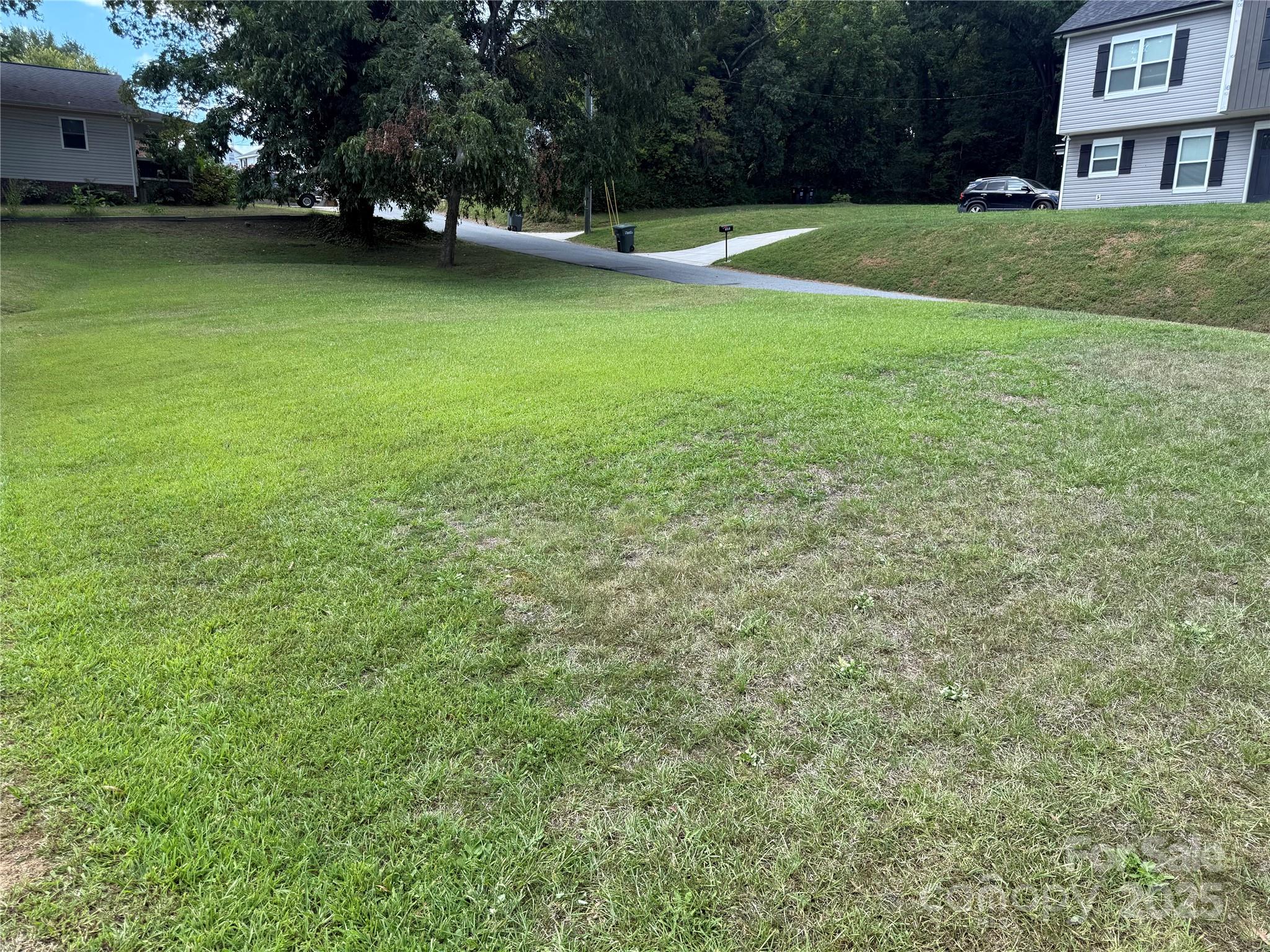 103 High Avenue Southwest Concord, NC 28025 - Photo 2 of 2 a view of outdoor space with deck and yard